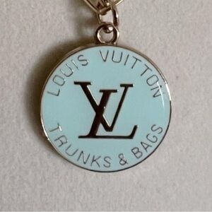 Set 2 Pc. Louis Vuitton Teal/Gold Logo Tag & 17” Gold chain w/lobster claw clasp